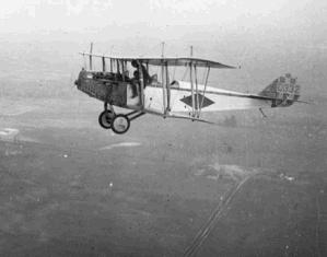 A "Jenny" biplane over Ontario, Canada, c. 1918 A "Jenny" biplane over Ontario, Canada, c. 1918
