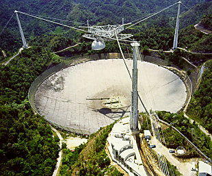 Arecibo Observatory, a 305-meter-wide radio telescope (courtesy of the NAIC - Arecibo Observatory, a facility of the NSF) Arecibo Observatory, a 305-meter-wide radio telescope (courtesy of the NAIC - Arecibo Observatory, a facility of the NSF)