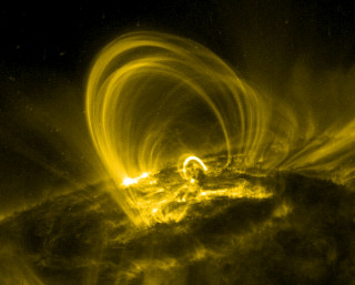 Plasma traveling along magnetic loops protruding from the sun's photosphere. Plasma traveling along magnetic loops protruding from the sun's photosphere.