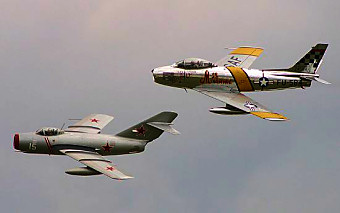 A MiG-15 and F-86, respectively. A MiG-15 and F-86, respectively.