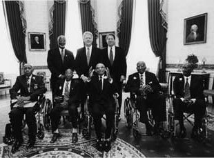 Bill Clinton with the surviving Tuskegee patients