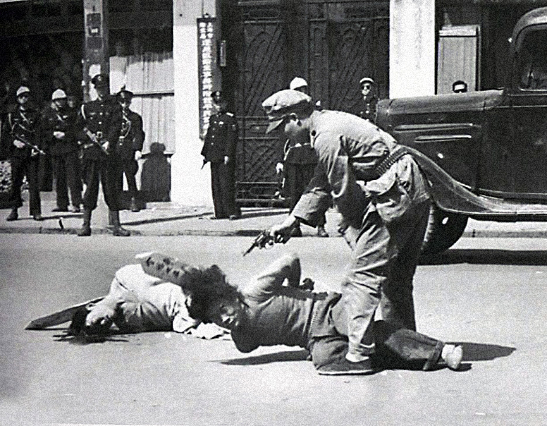 Militiamen executing suspected communists in Shanghai