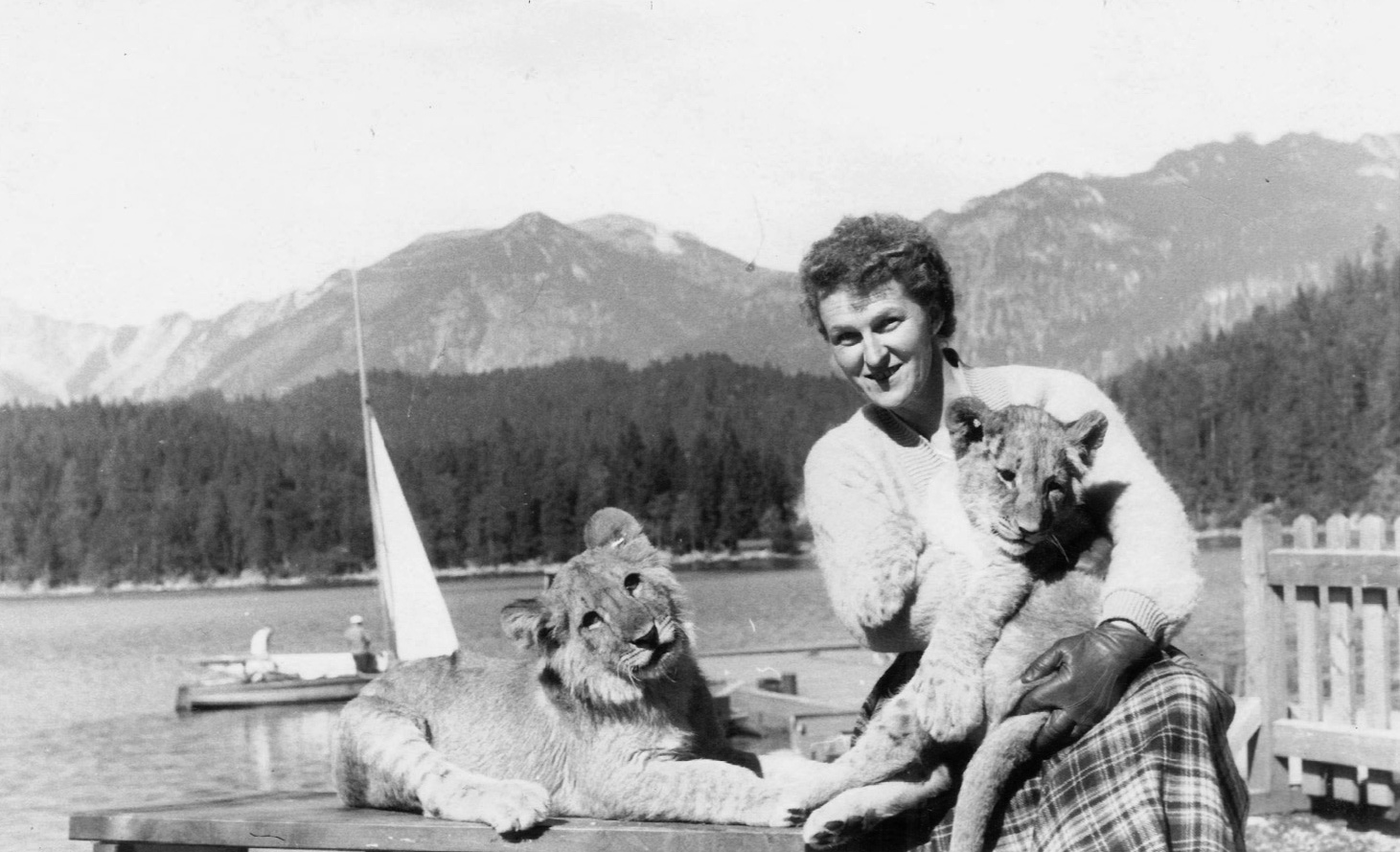 Hermine Braunsteiner ca. 1957, posing with lion cubs provided by photographer